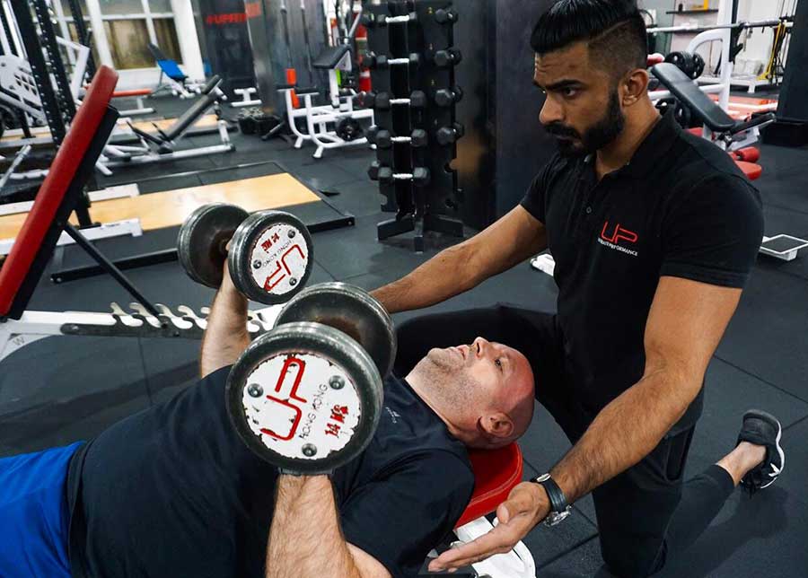 Dan-in-gym-dumbells | Ultimate Performance | Ultimate Performance